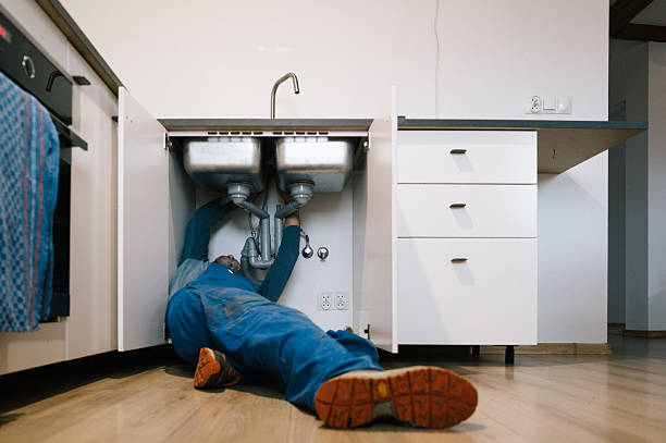 Professional Plumbing technician working in Warsaw, MO